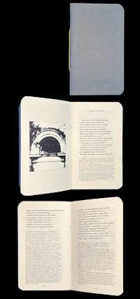 a book with an open page showing a picture of a bridge